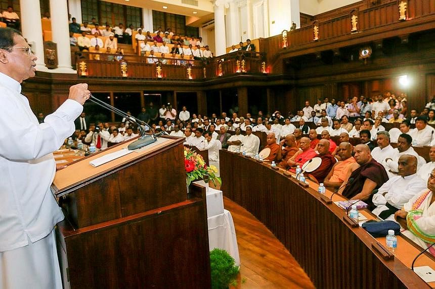 Sri Lankan President Maithripala Sirisena addressing Parliament in Colombo on Monday in this handout photo. -- PHOTO: AFP
