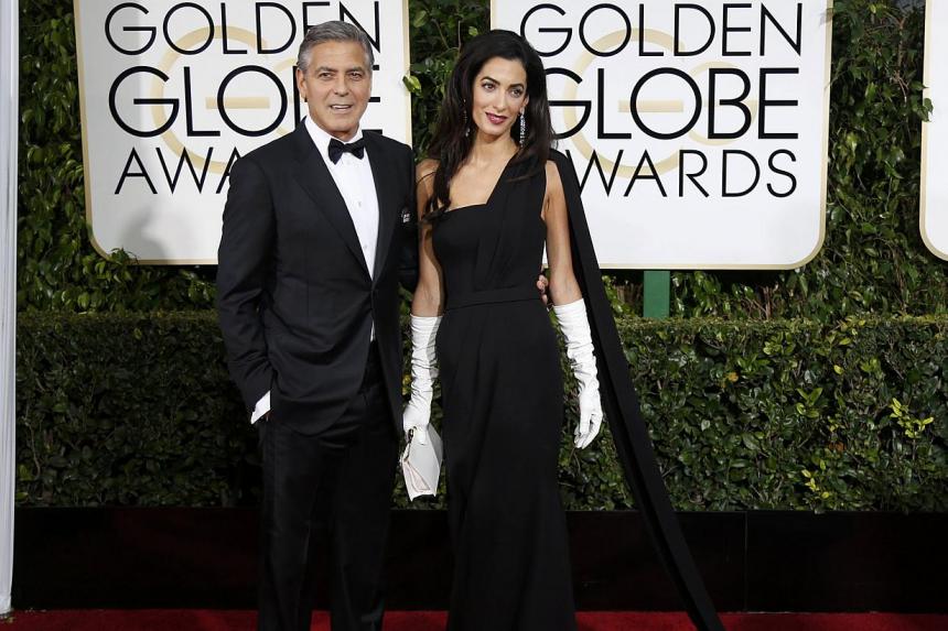 Amal Clooney's white gloves at the Golden Globes draw praise and