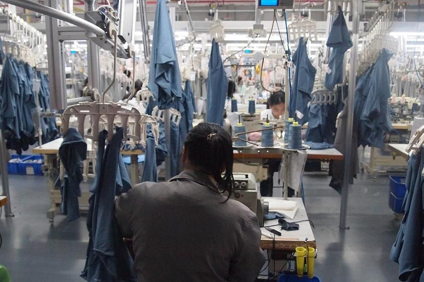 Uniqlo Pledges To Improve Factory Conditions In China After Claims Of