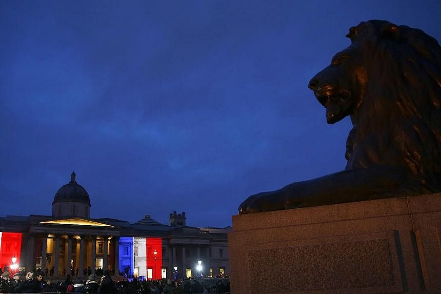 The colours of the French national flag are seen in Trafalgar Square as they are projected in tribute to the victims of the Paris terror attacks on the The National Gallery in London on Jan 11, 2015. Clearly, some journalists do believe that in such 