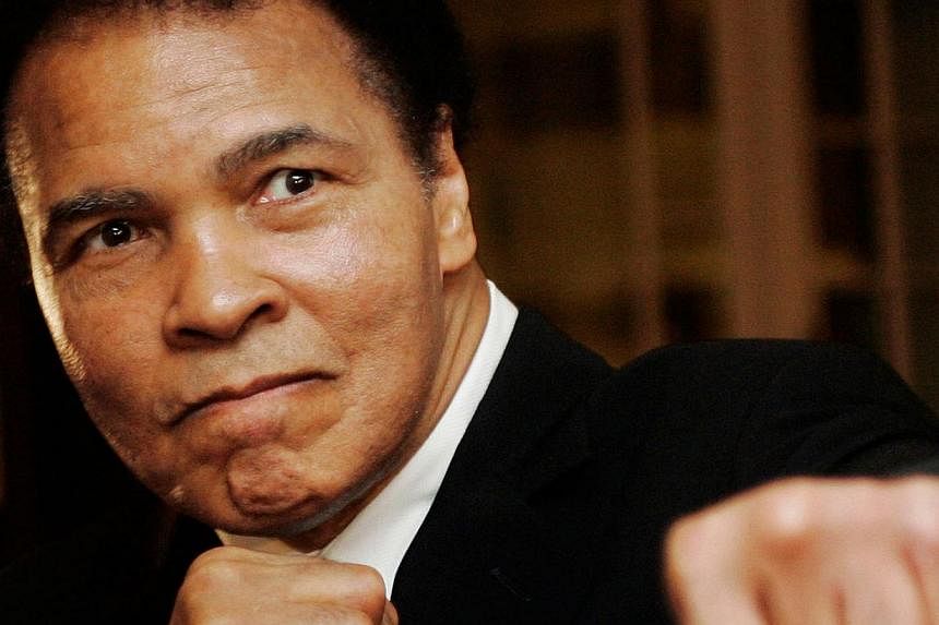 US boxing great Muhammad Ali at the Crystal Award ceremony at the World Economic Forum (WEF) in Davos, Switzerland, in 2006. -- PHOTO: REUTERS