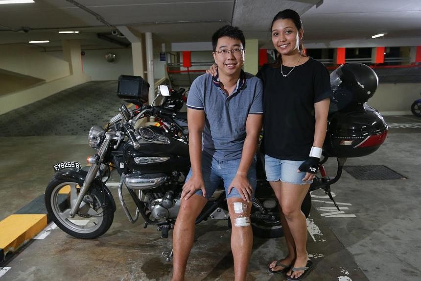 Mr Kun Wai Kit, 31, and Ms Shan Gomes, 30, escaped serious injury when their motorcycle skidded over the oil patch. They stayed to warn oncoming motorists of the danger before an LTA officer arrived on the scene.