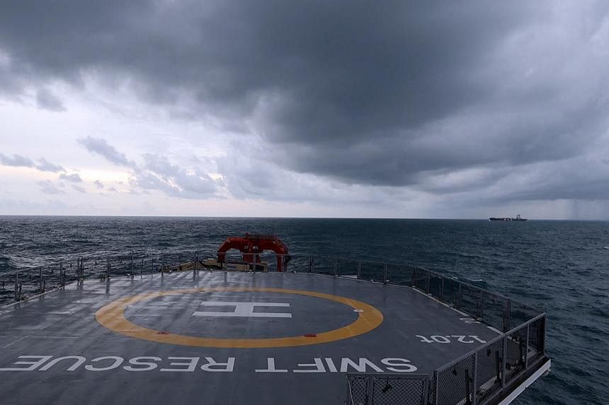 The MV Swift Rescue is returning after 20 days of search and rescue efforts for Air Asia flight QZ8501, which went missing on Dec 28 and was discovered in the Java Sea. -- ST PHOTO:&nbsp;SEAH KWANG PENG