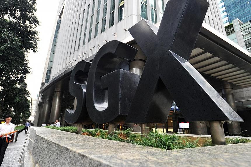 The Singapore Exchange has issued trade with caution notices on HongKong Land and Jardine Matheson Holdings, its indirect shareholder. -- ST PHOTO: LIM YAOHUI