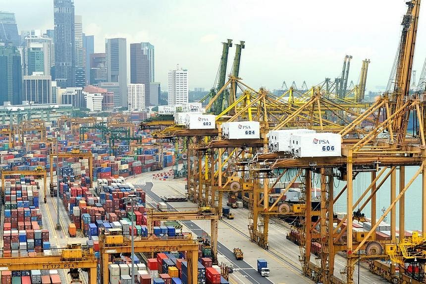 The maritime industry can be cautiously optimistic about this year's outlook with lower fuel costs as ports here hit another high in handling containers. -- ST PHOTO: TIFFANY GOH