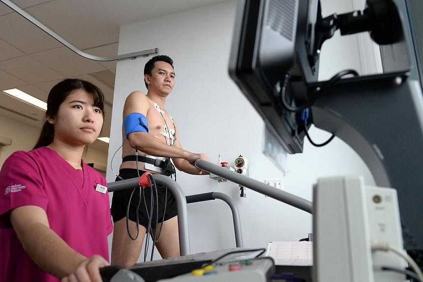 Housed within the recently-opened National Heart Centre Singapore l, the SAF heart screening centre will share state-of-art heart screening technology and have access to the Republic's leading cardiologists. -- ST PHOTO: DESMOND FOO