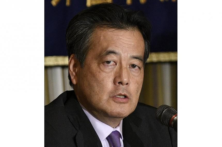 Japan's main opposition party, the Democratic Party of Japan (DPJ), picked acting leader and former Japanese deputy prime minister Katsuya Okada as its new chief on Sunday, Jan 18, 2015. -- PHOTO: EPA