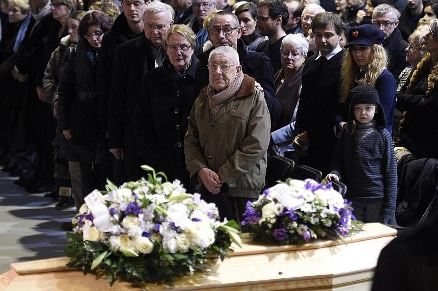 People attend the funeral ceremony of French cartoonist and Charlie Hebdo editor Stephane 'Charb' Charbonnier, in Pontoise, outside Paris, France, on Jan 16 2015.&nbsp;Almost half of French oppose publication of cartoons depicting Islam's Prophet Muh