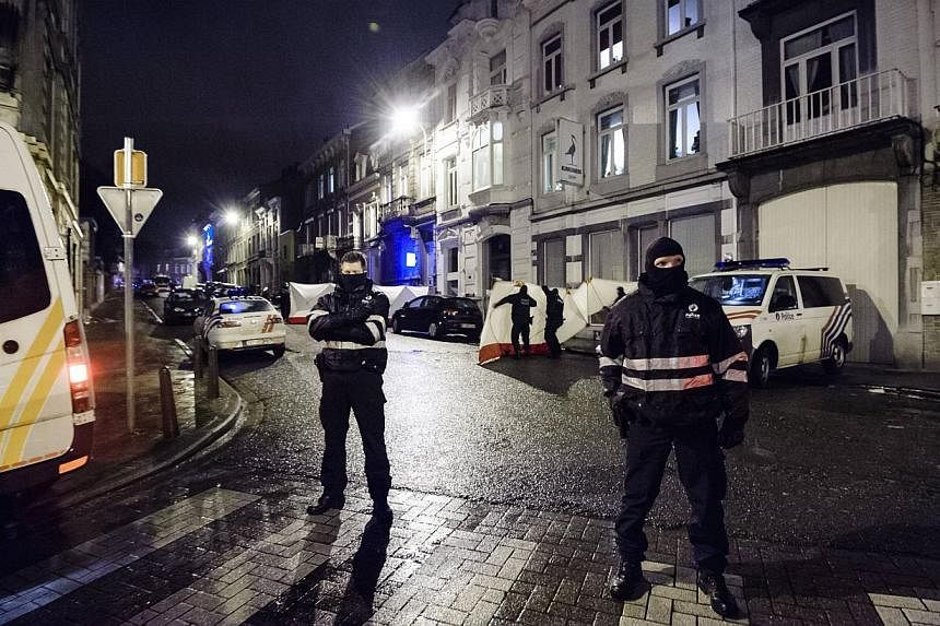 Belgian police block a street in central Verviers in the east of Belgium on Jan 15, 2015.&nbsp;At least four people were arrested in Athens on Saturday as part of a probe into an Islamic militant cell that was dismantled in Belgium this week before i