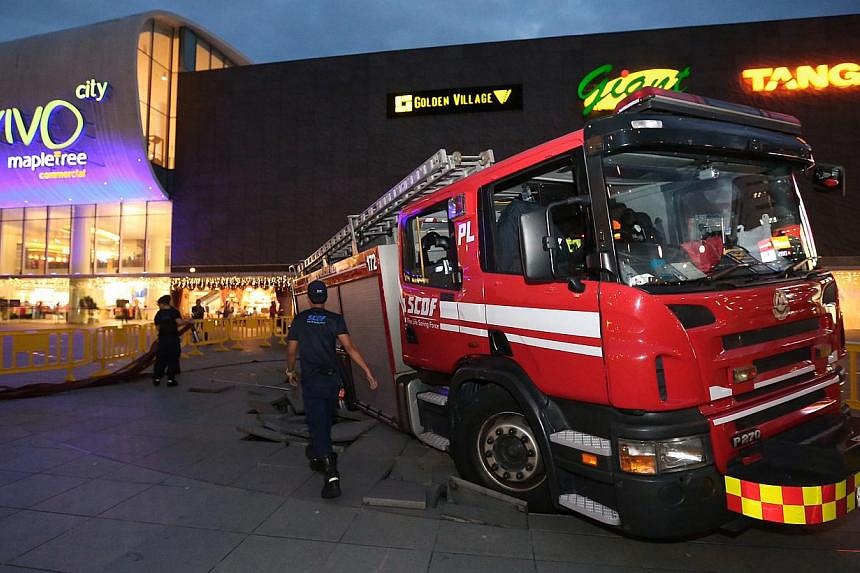 Fire engine stuck at VivoCity courtyard lifted out The Straits Times