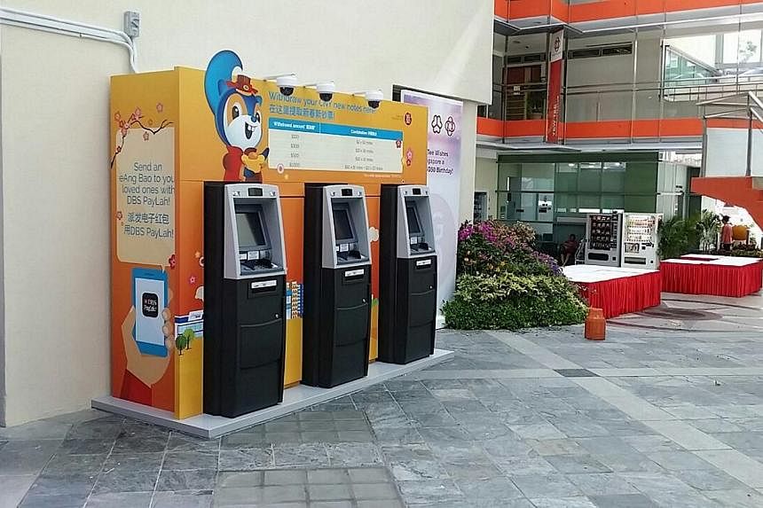 Temporary cash withdrawal machines installed by DBS may just be around for a short while but it does not mean their security measures are any less stringent. -- PHOTO: DBS