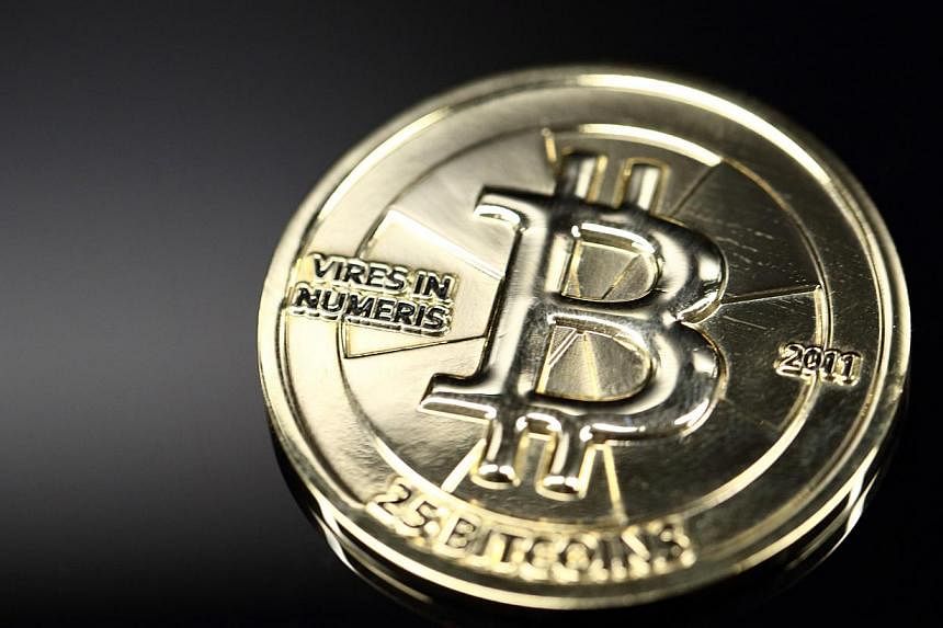 A twenty-five bitcoin digital currency. A Florida plumber who operated an underground bitcoin exchange selling the digital currency to users of the black market website Silk Road was sentenced to four years in prison on Tuesday. -- PHOTO: BLOOMBERG
