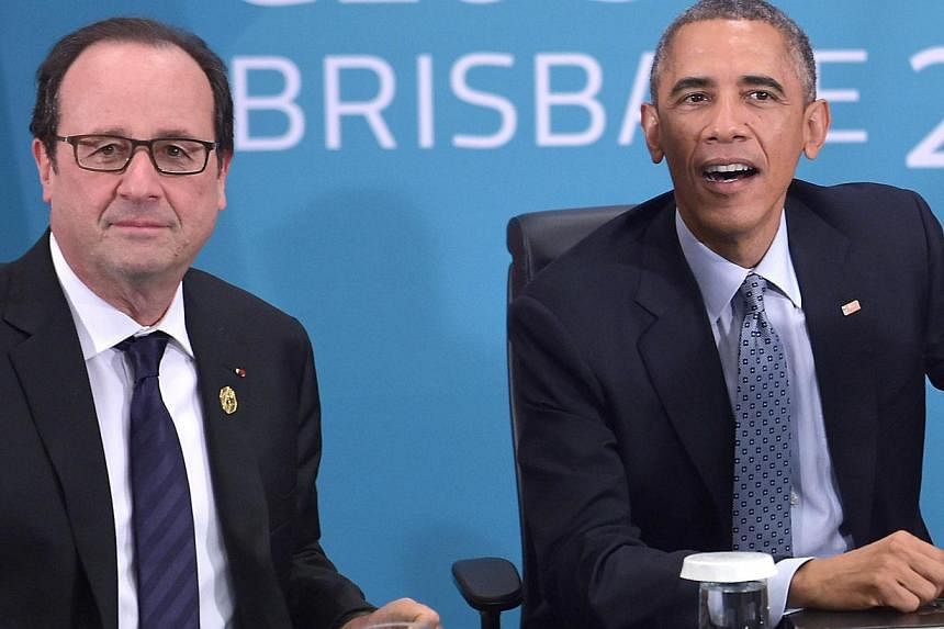 France's President Francois Hollande (left) and US President Barack Obama at a European leaders' meeting on the sidelines of the G-20 Summit in Brisbane, Australia, on Nov 16, 2014. The leaders spoke on the phone on Tuesday on the Paris attacks and t