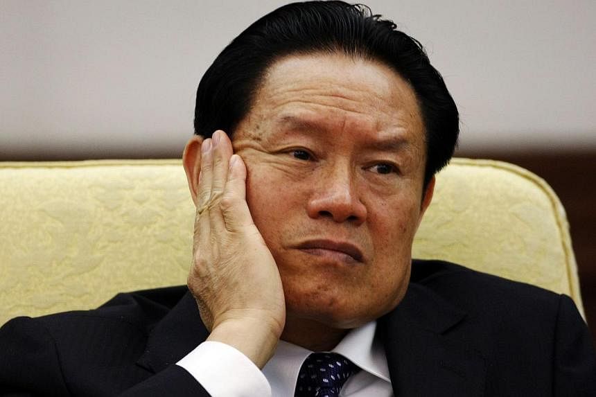 China's domestic security chief Meng Jianzhu&nbsp;said his disgraced predecessor, Zhou Yongkang (above), led many others astray, alluding to a widening crackdown on Zhou's friends and associates, the Beijing News reported on Wednesday, Jan 21, 2015. 