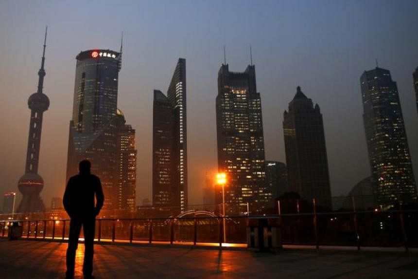 China shares soared on Wednesday, Jan 21, 2015, with the Shanghai Composite Index producing its biggest one-day percentage gain in more than five years as investor confidence continued to recover after Monday's plunge.&nbsp;-- PHOTO: REUTERS