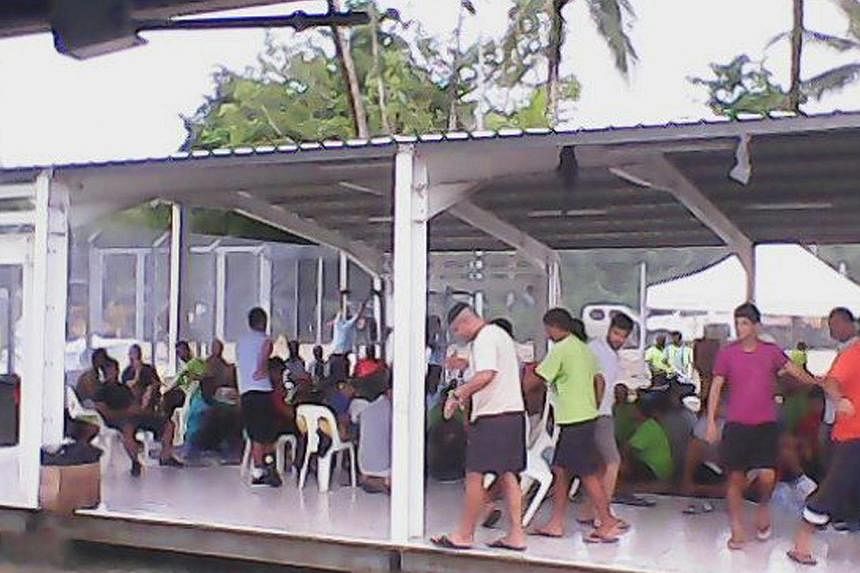 Asylum seekers are pictured in this handout photo provided by the refugee action coalition, taken inside the Manus Island detention centre in Papua New Guinea on Jan 13, 2015. A protest by hundreds of asylum seekers at the Australian detention centre