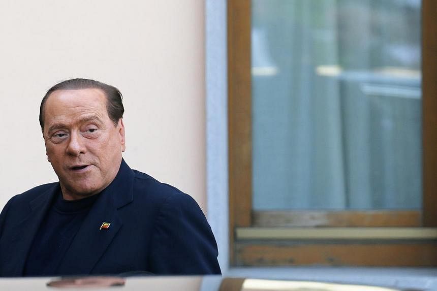 Former Italian Prime Minister Silvio Berlusconi (above) denied media reports on Wednesday that his AC Milan soccer club was up for sale, saying he was not ready to part with the team he has owned for nearly 29 years. -- PHOTO: REUTERS