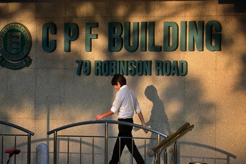 People walking past the CPF Building logo at the foot of the building along Robinson Road. The National Trades Union Congress (NTUC) has called for an improvement to the Central Provident Fund (CPF) system to better meet the retirement needs of worke