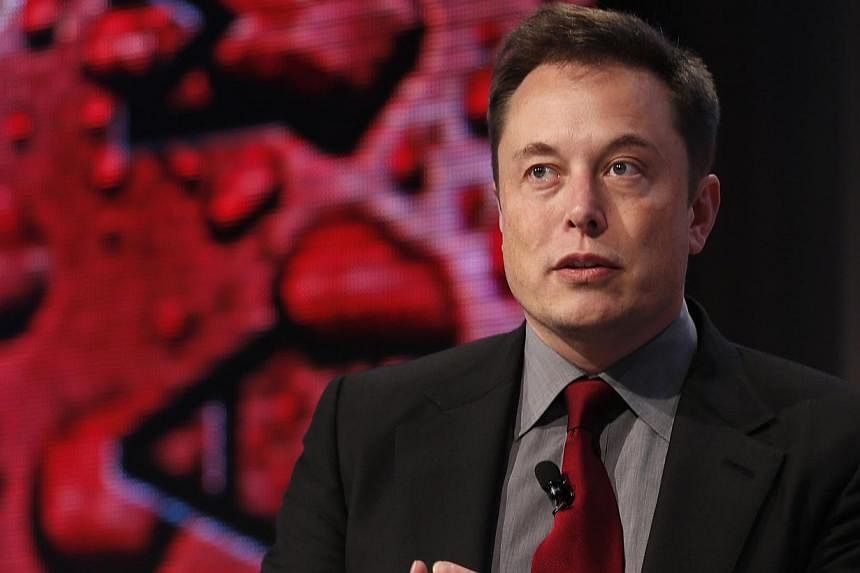 Billionaire Elon Musk has said his company, SpaceX, expects to spend at least US$1 billion (S$1.3 billion) on satellite activities. -- PHOTO: REUTERS
