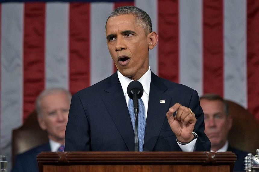 US President Barack Obama delivers the State of The Union address on Jan 20, 2015, at the US Capitol in Washington, DC. Mr Obama on Tuesday called on the US Congress to pass a new authorisation of force against the Islamic State in Iraq and Syria (IS