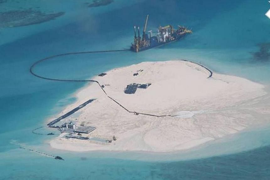 A photograph dated Feb 25, 2014, showing reclamation work being done at the Johnson South Reef, which is claimed by the Philippines and Vietnam.&nbsp;Philippine officials accused China on Wednesday, Jan 21, 2015, of expanding reclamation work in disp