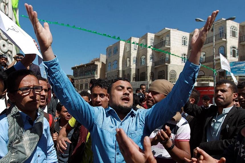 Yemeni protesters shout slogans during a rally against against the control of capital the by Shiite Huthi rebels on Jan 23, 2015 in the capital Sanaa.&nbsp;Yemen drifted deeper into political limbo on Friday after President Abd-Rabbu Mansour Hadi res