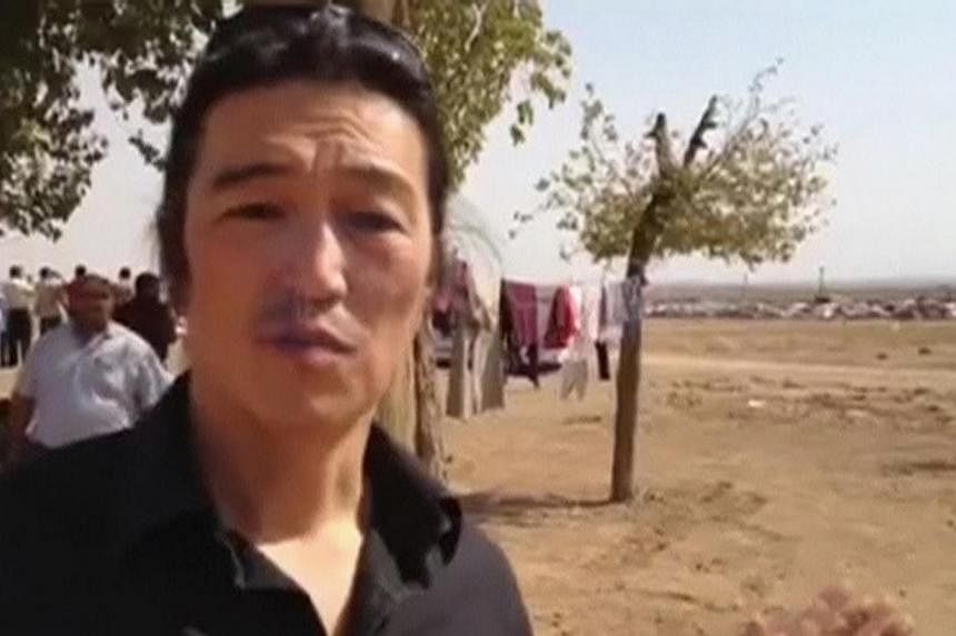 A screen grab taken from the website www.reportr.co&nbsp;showing Japanese journalist Kenji Goto reporting in Kobani, Syria, in October 2014. -- PHOTO: REUTERS