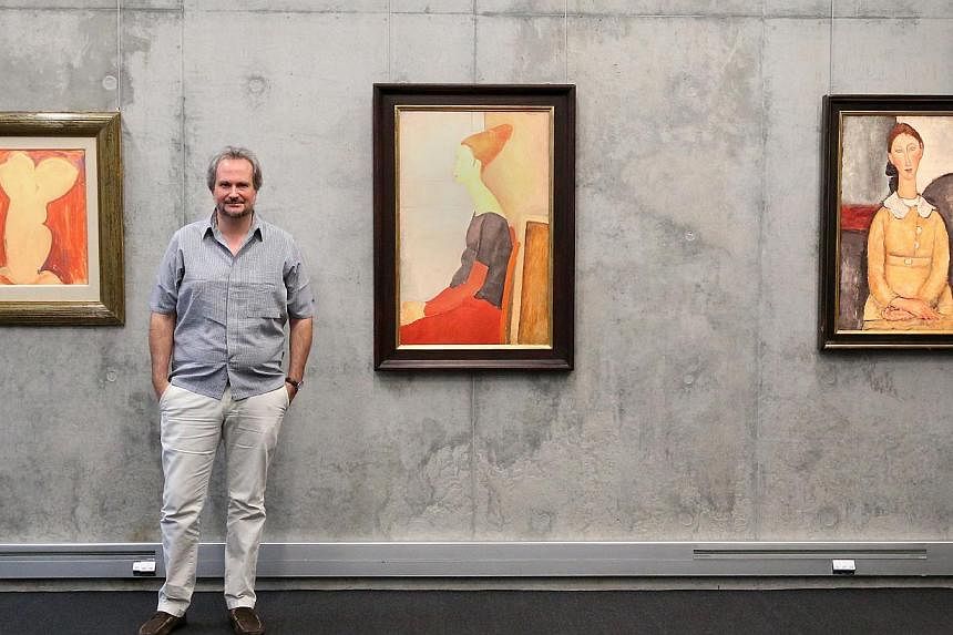 Founder of Singapore Pinacotheque museum Marc Restellini intends to share rarely-seen 20th century artworks, such as the paintings of Italian artist Amodeo Modigliani. -- ST PHOTO: NEO XIAOBIN