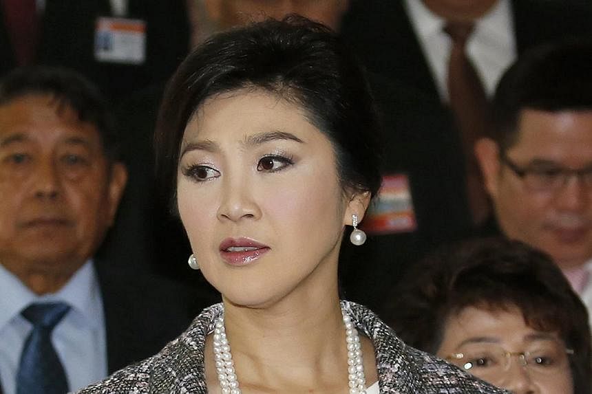 Former Thai prime minister Yingluck Shinawatra leaving after answering to the questions of the National Legislative Assembly (NLA) during impeachment proceedings against her, at Parliament House in Bangkok, Thailand, on Jan 22, 2015. Ms&nbsp;Yingluck