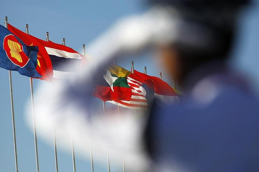 Asean will officially call itself a single market by year's end, but "big things" like seamless travel within the 10-nation bloc would only come in 2020, Malaysia's trade minister told AFP in an interview. -- PHOTO: REUTERS