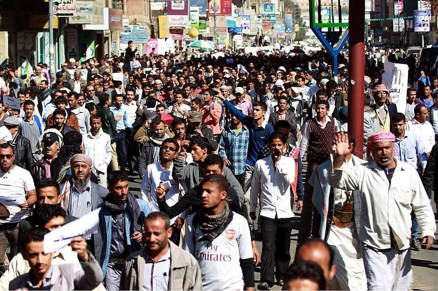 Yemenis take part in a rally against the control of capital the by Shiite Huthi rebels on Jan 24, 2015, in the capital Sanaa. -- PHOTO: AFP