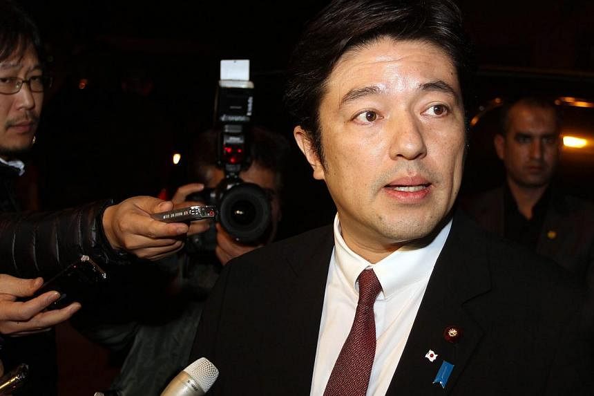 Japanese Vice-Foreign Minister Yasuhide Nakayama speaking to reporters at a hotel in Amman, Jordan on Jan 23, &nbsp;2015. Mr Nakayama is heading the negotiations for the release of the two hostages. -- PHOTO: EPA
