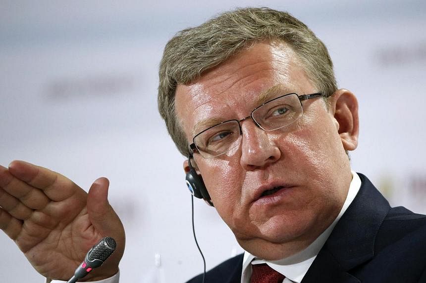 Russia is starting to see a wave of mass layoffs as a result of the plunging economy and needs to rethink where and how fast it spends its reserves, former finance minister Alexei Kudrin said. -- PHOTO: REUTERS&nbsp;