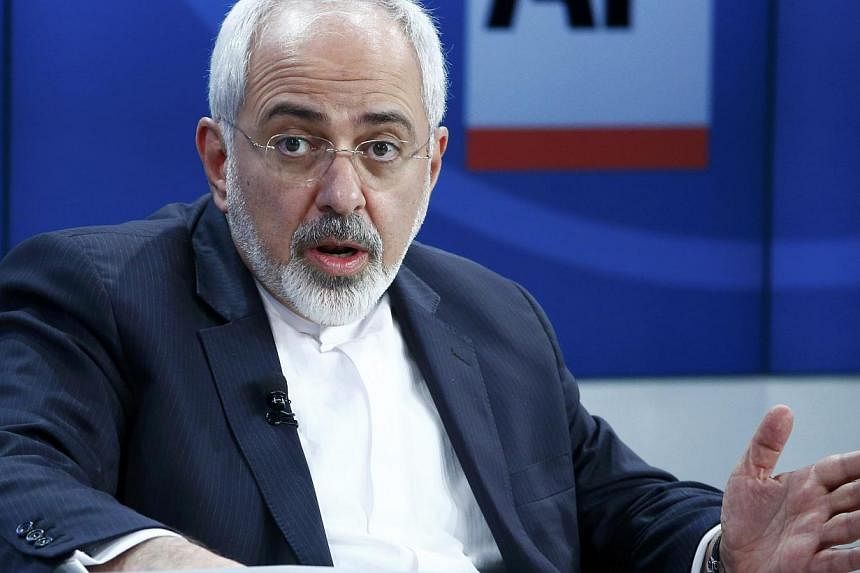 Iranian Foreign Minister Mohammad Javad Zarif speaking during the session The Geopolitical Outlook in the Swiss mountain resort of Davos on Jan 23, 2015. Iran warned the US Congress on Friday against imposing new sanctions, saying this would lead to 
