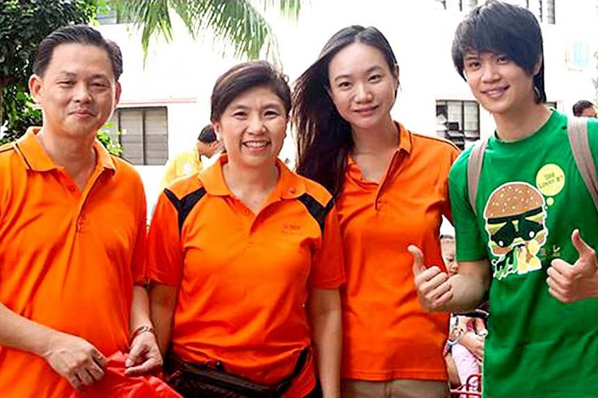 (From left) Tan Lam Siong, Jeannette Chong-Aruldoss, Nicole Seah and Elson Soh at a NSP goodie bag distribution in May 2013. -- PHOTO: JEANNETTE&nbsp;CHONG-ARULDOSS/FACEBOOK