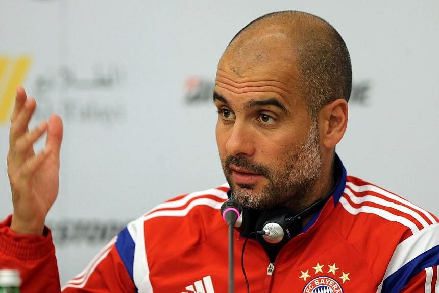 Bayern Munich's Spanish Manager Josep "Pep" Guardiola speaks during a press conference in Riyadh on Jan 17, 2015, ahead of their friendly match with Saudi Al-Hilal. The German champions have repeatedly signalled their desire for a contract extension 