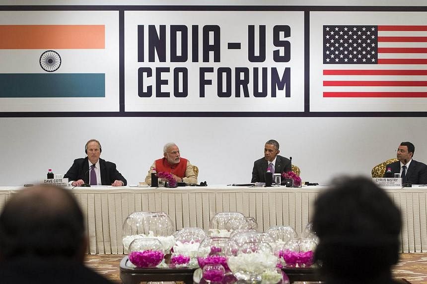 Indian Prime Minister Narendra Modi (second from left) and US President Barack Obama (second from right) participate in the India-US Business Summit in New Delhi on Jan 26, 2015.&nbsp;-- PHOTO: AFP