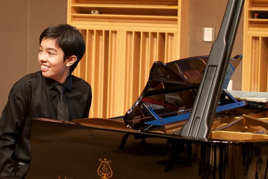 Malaysian pianist Tengku Ahmad Irfan also loves mathematics and science and enjoys playing video games too. -- PHOTO: THE TOP &amp; JOANNE ROBINSON