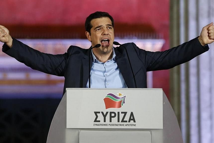 The head of the Syriza party Alexis Tsipras speaking to supporters after winning the elections in Athens on Jan 25, 2015. -- PHOTO: REUTERS&nbsp;