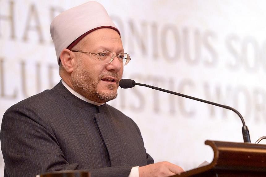 Egypt's Grand Mufti Sheikh Shawki Allam delivers the Muis Lecture, "Building Harmonious Societies in a Pluralistic World" at the Orchard Hotel on Jan 26, 2015.&nbsp;The principle of moderation in all things is a key part of Islamic teachings, Dr Alla
