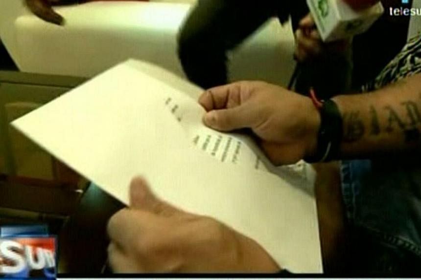 TV grab taken from Latin American television network Telesur of Argentinian former football player Diego Maradona as he speaks to the press on a letter sent to him by former Cuban President Fidel Castro on Jan 12, 2015 in Havana. Fidel Castro has wri