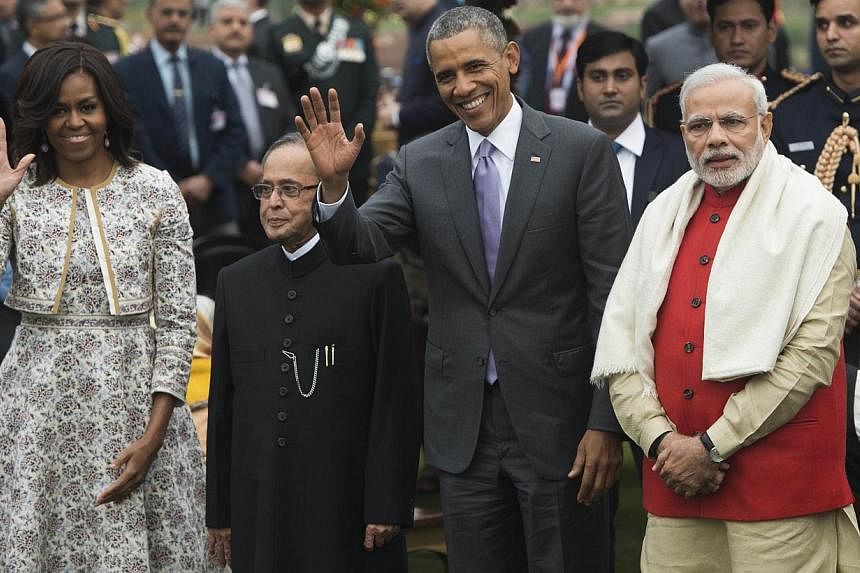 (From left) US First Lady Michelle Obama, Indian President Pranab Mukherjee, US President Barack Obama and Indian Prime Minister Narendra Modi at a reception at Rashtrapati Bhawan, the presidential palace, in New Delhi on Jan 26, 2015. -- PHOTO: AFP