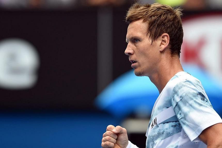 Tomas Berdych played arguably the grand slam quarter-final of his life to end the longest losing streak on the ATP Tour with a 6-2 6-0 7-6(5) victory over Rafa Nadal. -- PHOTO: EPA&nbsp;