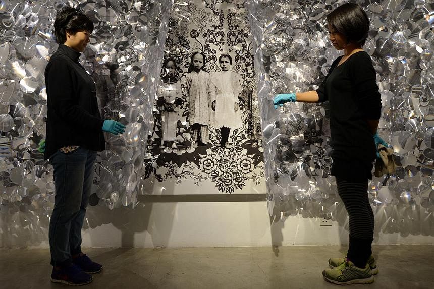 I Was Like That Myself… We All Held Each Other’s Hands (above) and We Cloud&nbsp;are among five series of works that Suzann Victor created during&nbsp;her residency at the Singapore Tyler Print Institute. -- ST PHOTO: ALPHONSUS CHERN