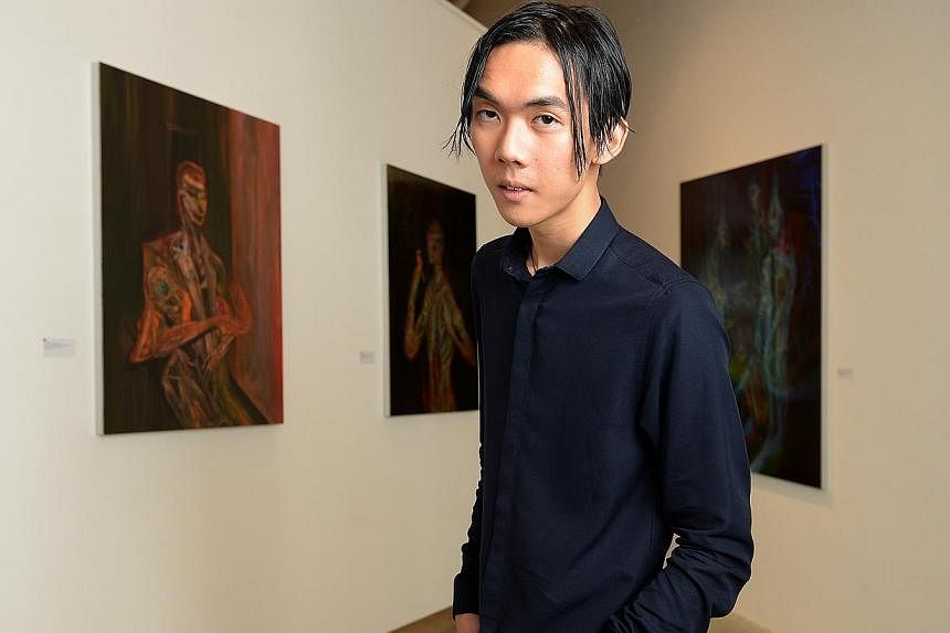 All 12 of Ruben Pang’s works portraying creators in the midst of contemplation and obstacles have been snapped up. -- ST PHOTO: DESMOND WEE