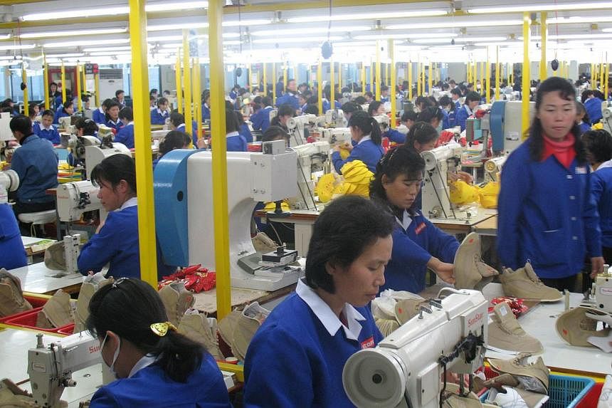 The Kaesong complex, which lies about 10 km inside North Korea, hosts some 100 Seoul-owned factories where 53,000 North Korean workers produce goods from clothes to watches. -- PHOTO: ANDREW SALMON