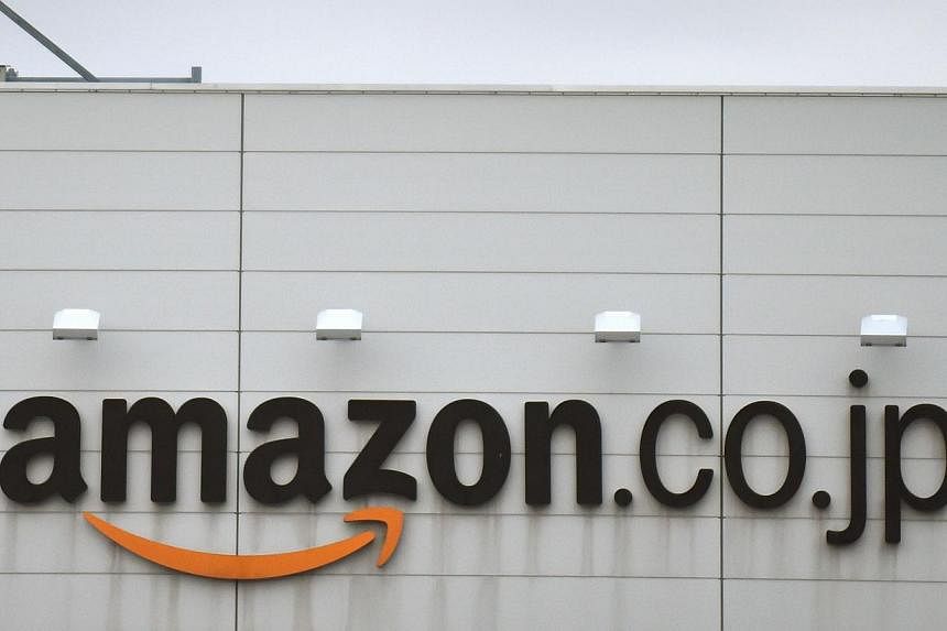 The Japanese arm of Amazon.com said on Tuesday it was "cooperating fully" with a police investigation into the sale of child pornography, after the authorities reportedly raided its Tokyo headquarters. -- PHOTO: AFP