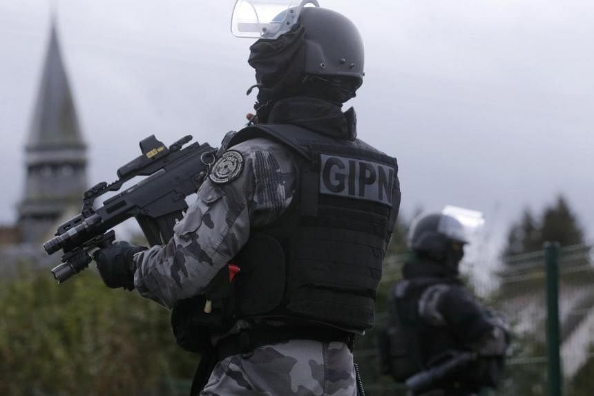 Four men were arrested on Tuesday by France's GIPN police special forces in the southern French town of Lunel, in an action aimed at breaking up extremist networks, a police source said. -- PHOTO: REUTERS