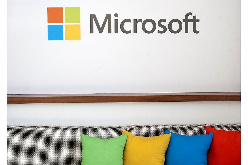 Microsoft Corp expects its fiscal third-quarter revenue growth to be cut by 4 per cent by unfavourable currency exchange rates. -- PHOTO: AFP