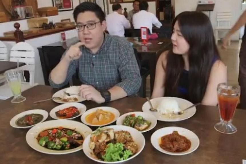 Razor TV multimedia journalists Low Yi Qian and Olivia Chang went to Rumah Makan Minang at Kandahar Street to try out the popular dishes offered by the nasi padang restaurant. -- PHOTO:SPH RAZOR TV